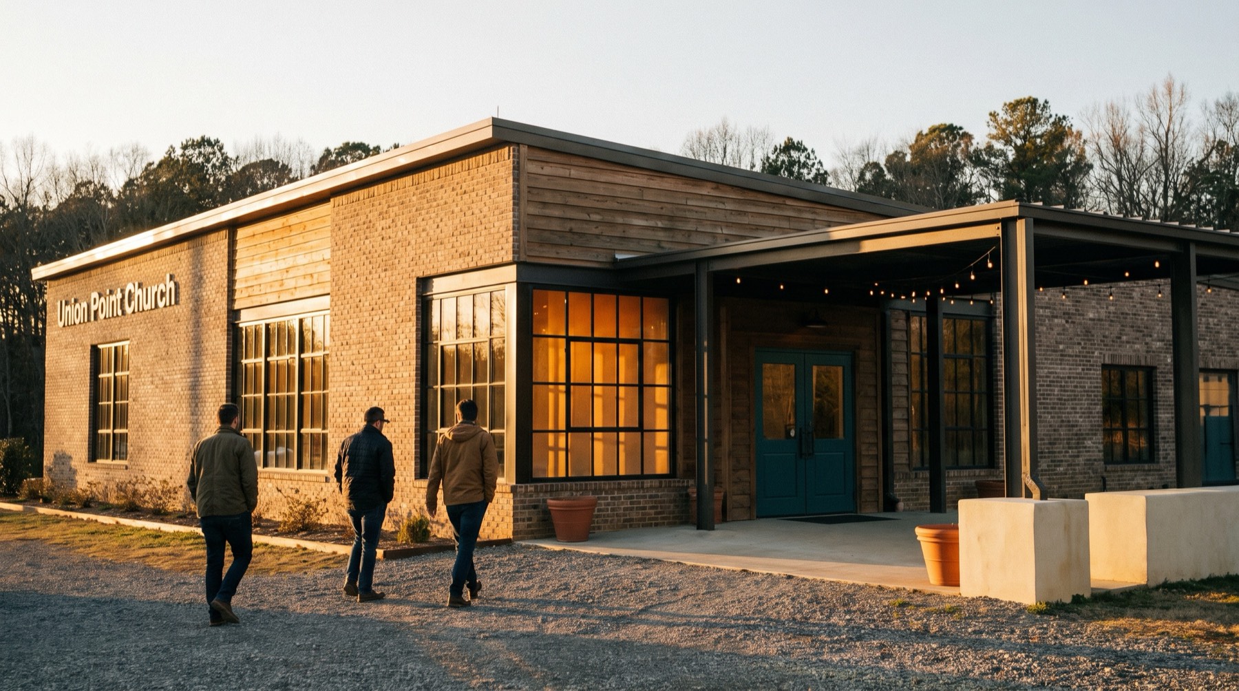 Union Point Church building exterior glowing at golden hour.